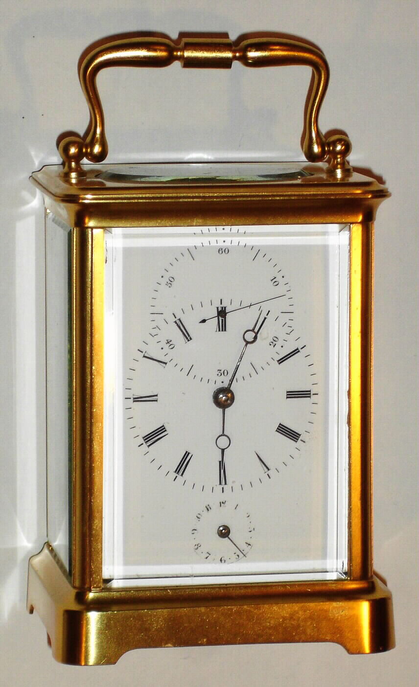 French, Brass cased carriage timepiece with embossed platform and duplex escapement, the balance with bat wings. There is a large seconds hand above 12 that completes its minute circle in 36 seconds, c1900 — Antique Clocks Price Guide
