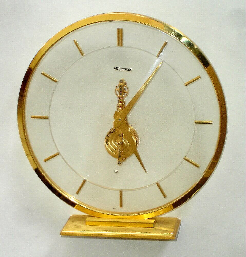 Swiss, LeCoultre, skeletonized desk clock with movement visible through the dial, 16 jewels, 8-day, c1980 — Antique Clocks Price Guide