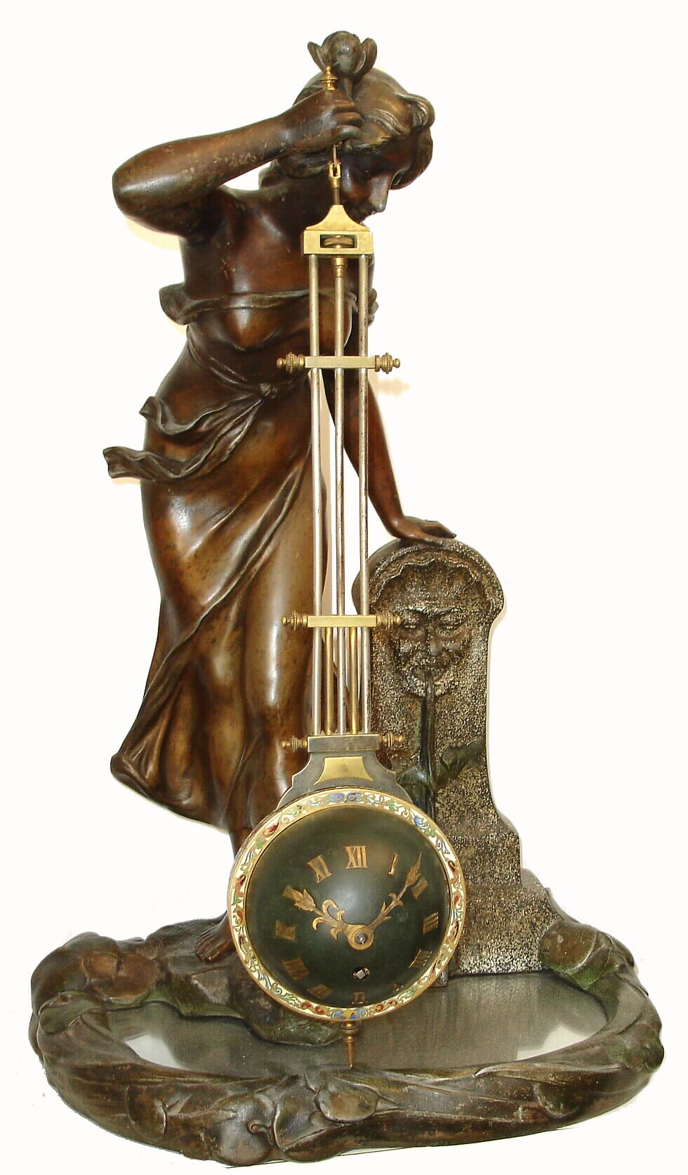 French, Mysterious Novelty clock, the movement contained at the bottom of the pendulum, and the pendulum swinging without apparent impulse. The ring surrounding the pendulum spring mystery suspension, similar to a swinging arm clock, c1880 — Antique Clocks Price Guide