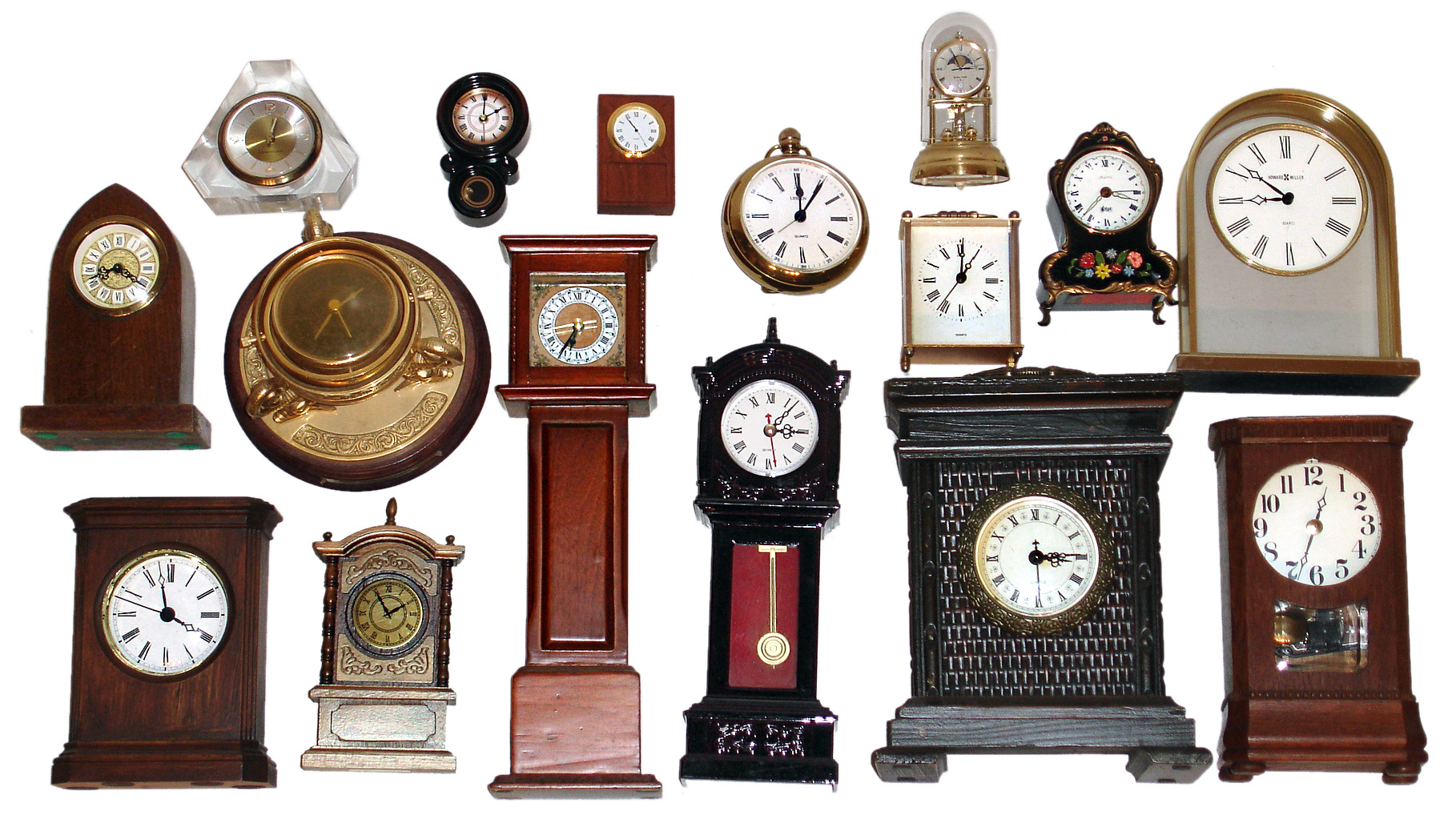 Sixteen-clock box lot, mostly small quartz novelties and a few windups, late 20th century. — Antique Clocks Price Guide