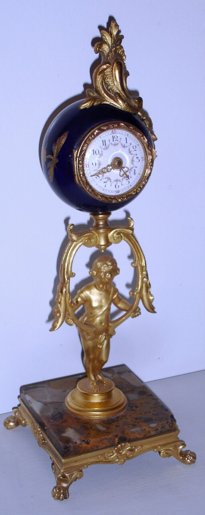 French, 8 day, platform movement gilt and blue enamel figural desk or table timepiece. c.1900 — Antique Clocks Price Guide