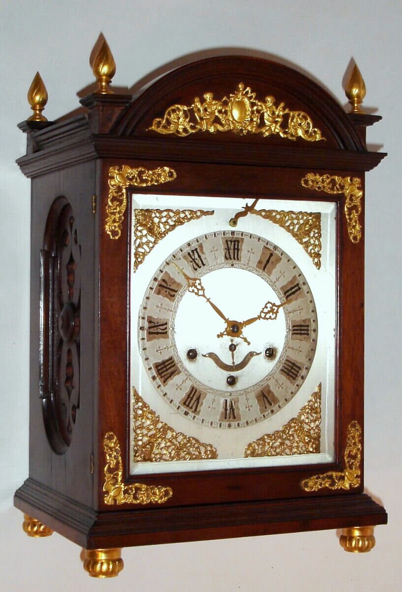 New Haven Clock "Eight Bell Chime No. 1", Mahogany case with gilt trimmings with quarter chime on 4 or eight bells and striking the hour on a gong. c.1900 — Antique Clocks Price Guide