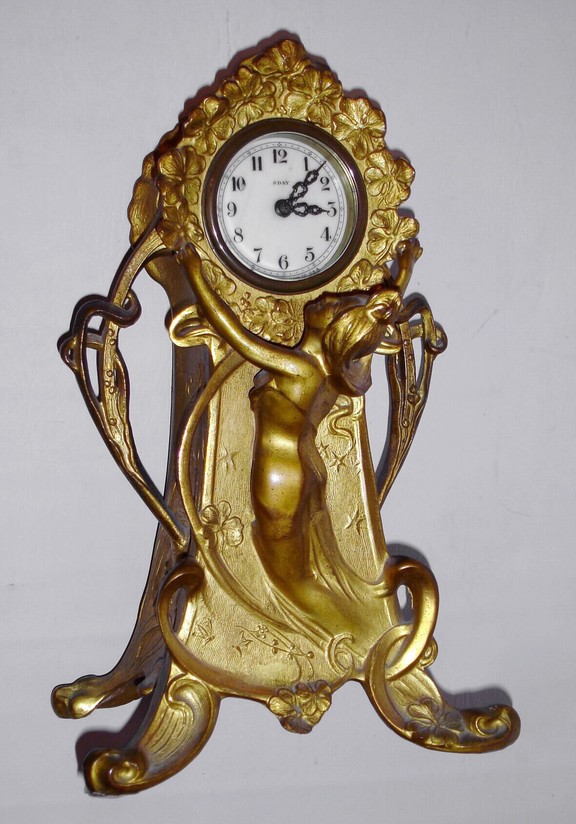 New Haven Clock Co., New Haven, Conn., "Trouville" figural timepiece 8 day spring driven movement in gilt case, c1913 — Antique Clocks Price Guide