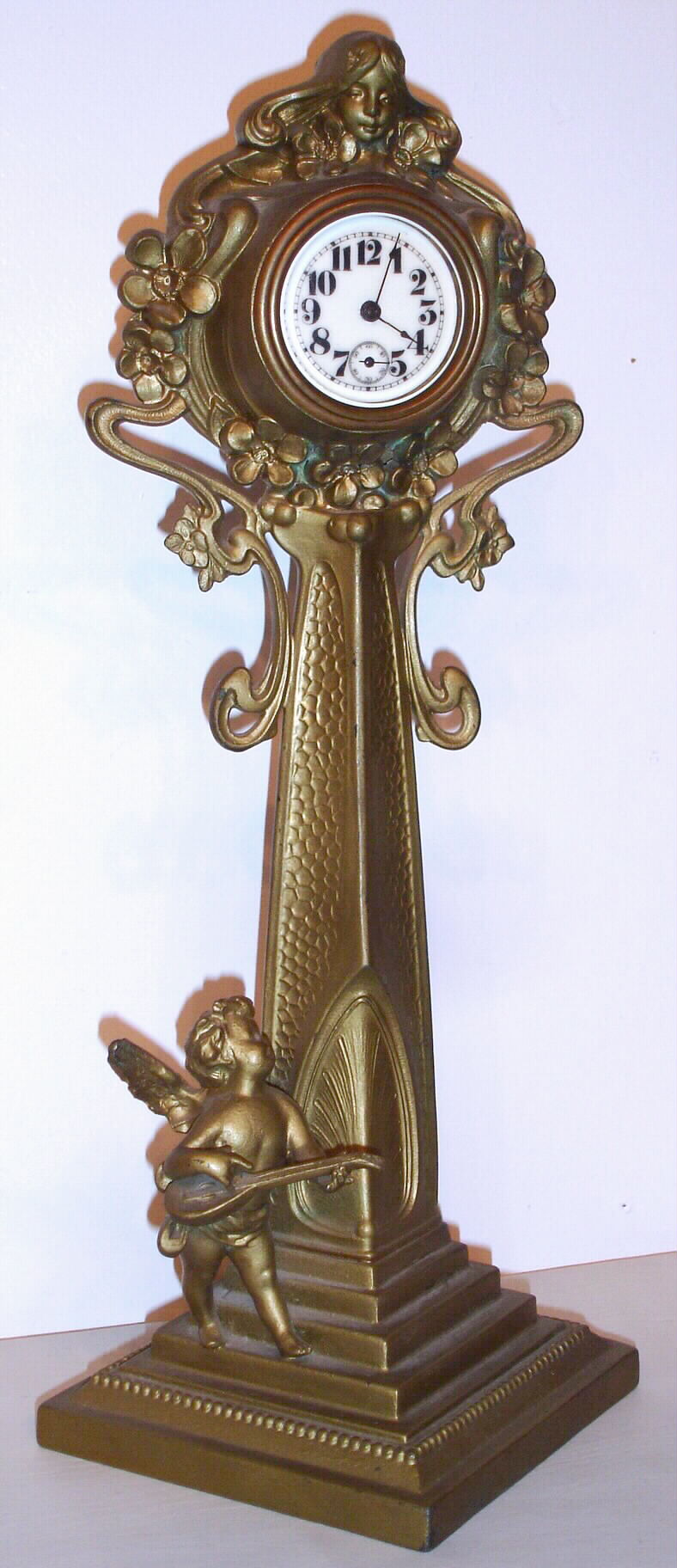 Jennings Brothers Mfg Co., Bridgeport, Conn., 30-hour figural timepiece. This firm was in business from 1891 to the 1950's. There catalog in the 1920's period contained over 3,000 items. The movement in the case may have been supplied by the New Haven Clock Co, c1920 — Antique Clocks Price Guide