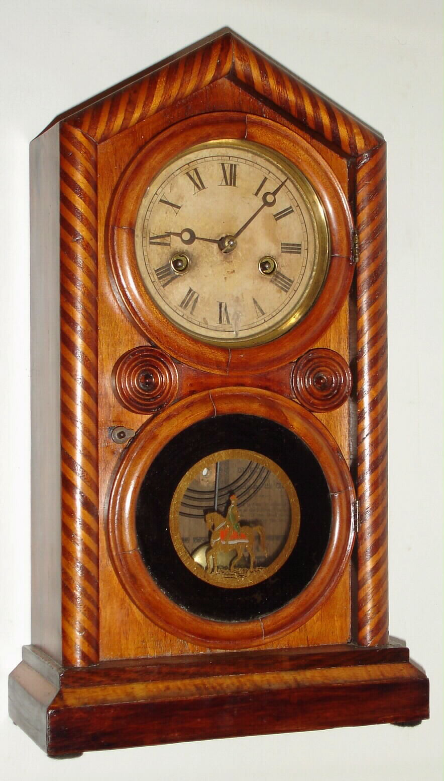 E. Ingraham and Co., 30-hour "Candy Strip Doric", time/strike shelf clock, c1890 — Antique Clocks Price Guide