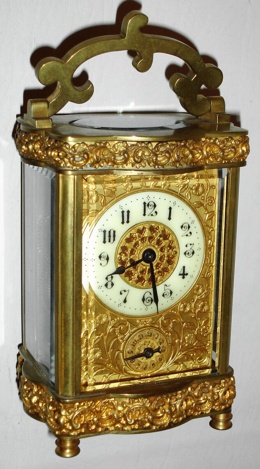 French, "Louis XV Doucine" style case 8 day carriage timepiece with alarm and arabic number white enmael dial, c1900 — Antique Clocks Price Guide