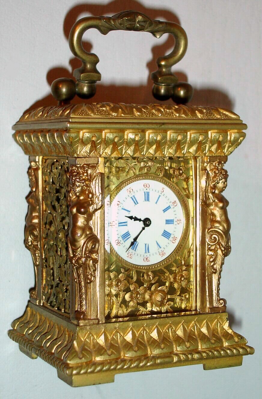 French, 8 day Caryatids style gilt case with pierced and chased decoration miniature carriage timepiece, c1889 — Antique Clocks Price Guide