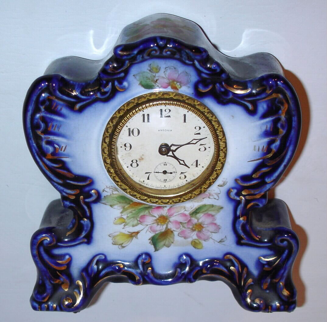 Ansonia Clock Co., "Chickadee", 30-hour miniature porcelain mantel timepiece. c.1904 — Antique Clocks Price Guide