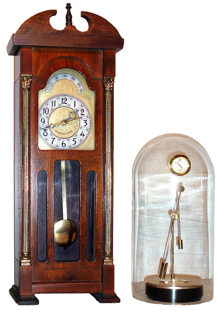 Three-piece mixed lot: French metal case, Sessions plug in long case form, Seiko quartz novelty. — Antique Clocks Price Guide