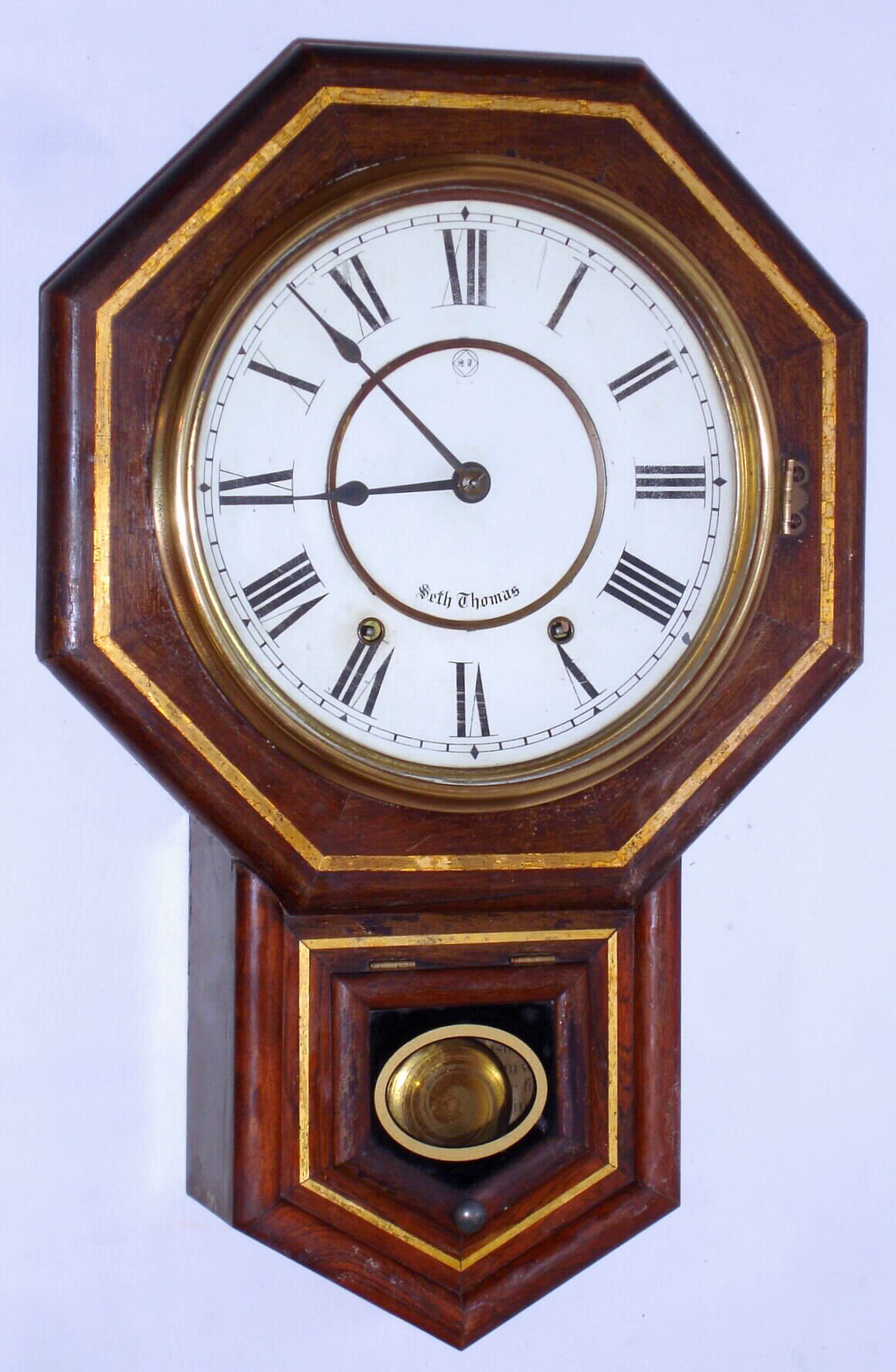 Seth Thomas Clock Co., Thomaston, Conn., "Drop Octagon 10" 8 day time and strike mahogany wall clock, dated 1893 — Antique Clocks Price Guide