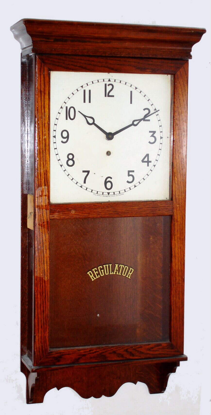 Arthur Pequegnat Clock Co., Canada, oak 8 day time only wall clock, c1920. — Antique Clocks Price Guide