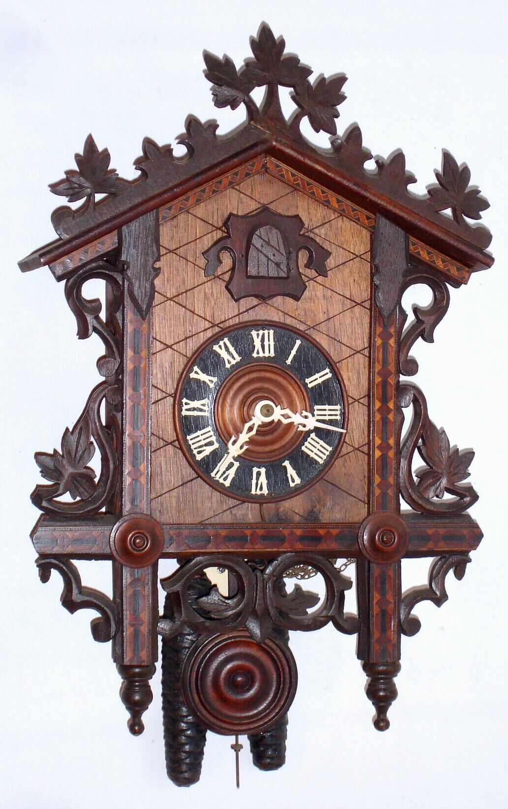American Cuckoo Clock Co., Philadelphia, 30 hour two weight driven inlaid cuckoo clock, c1910 — Antique Clocks Price Guide