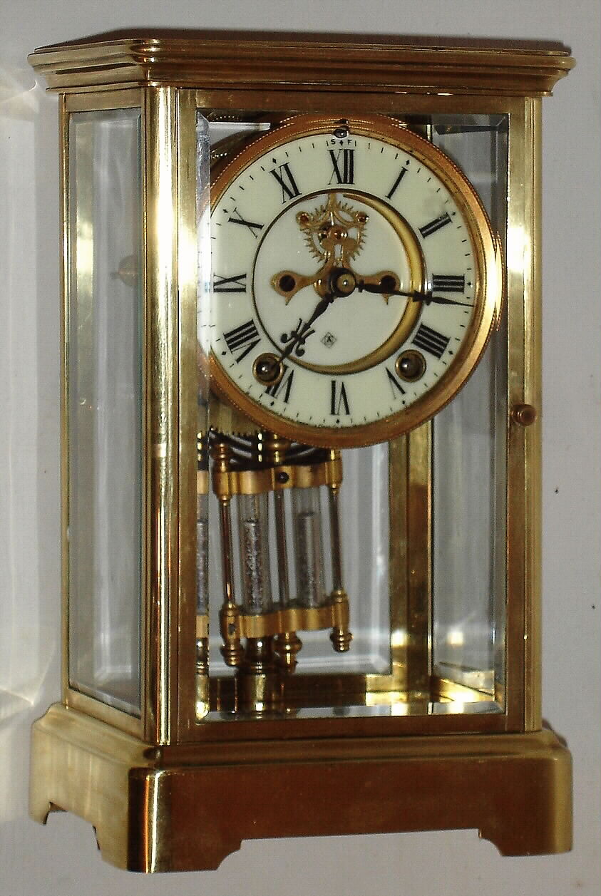 Ansonia Clock Co., New York, "Prism" 8 day time and strike spring driven crystal regulator mantel clock, c1914 — Antique Clocks Price Guide