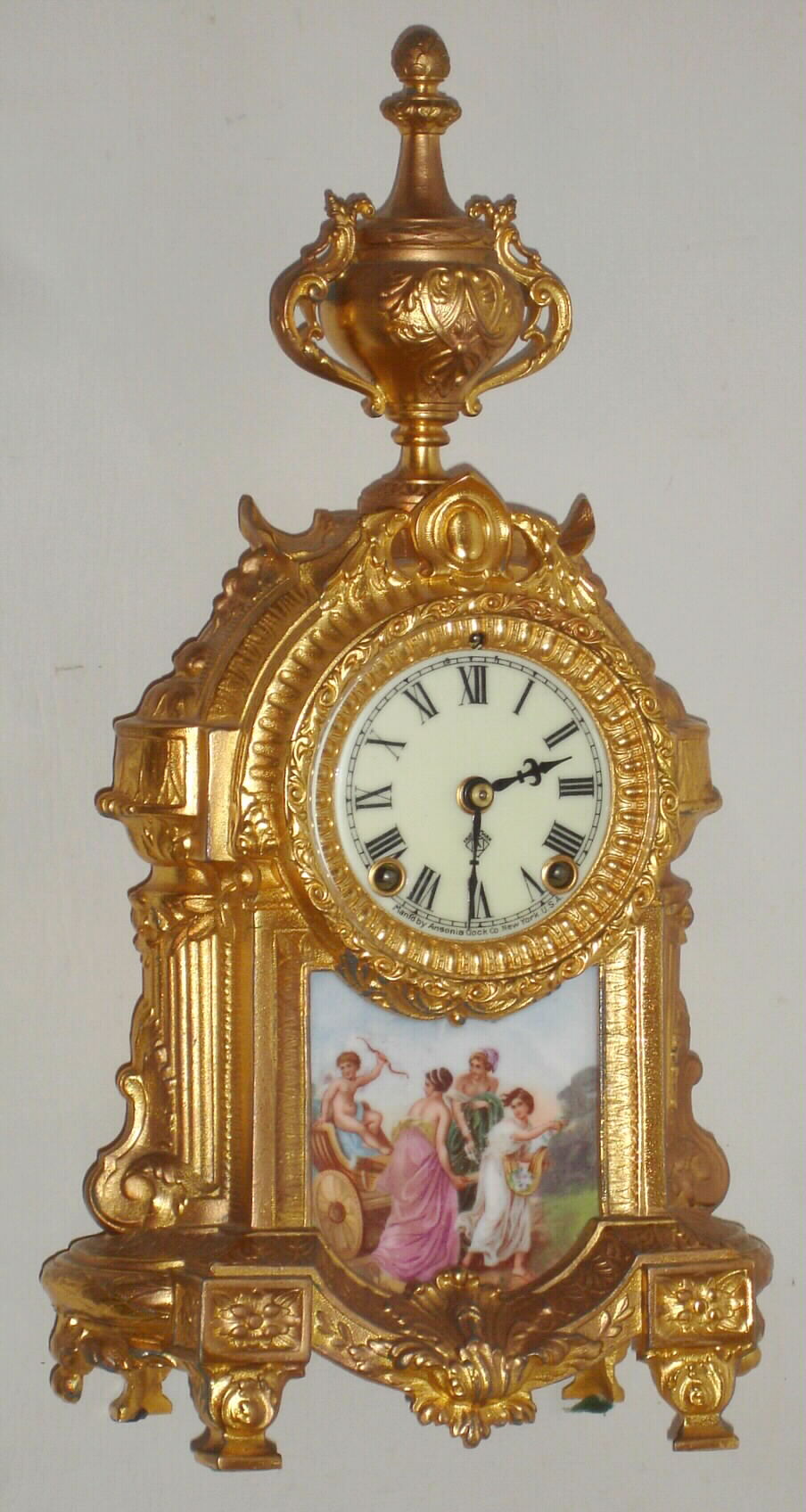 Ansonia Clock Co., New York, "La Versailles" cast metal and porcelain panel 8 day time and strike spring driven mantel clock, c1914 — Antique Clocks Price Guide
