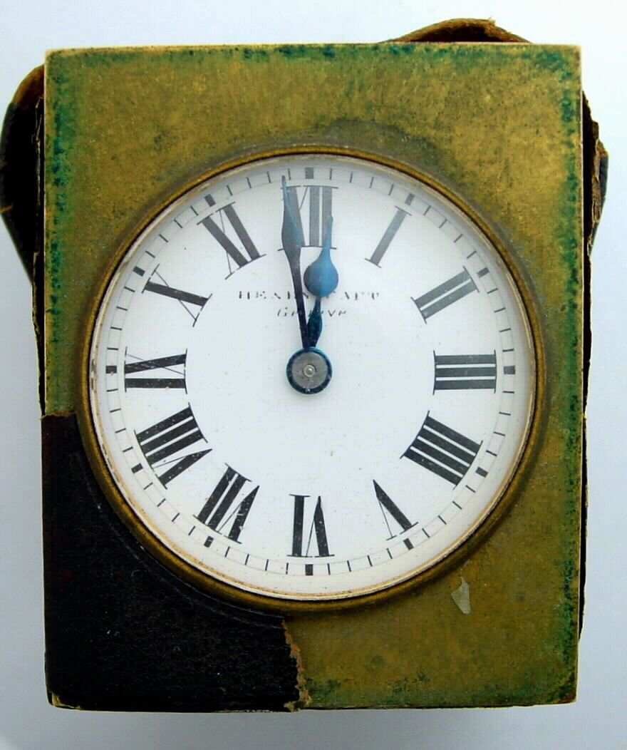 Henry Capt, Geneve Switzerland miniature carriage clock / travel clock key wind key set movement with platform lever escapement in leather covered brass rectangular case with Roman numeral white enamel dial, sNo. 291 — Antique Clocks Price Guide