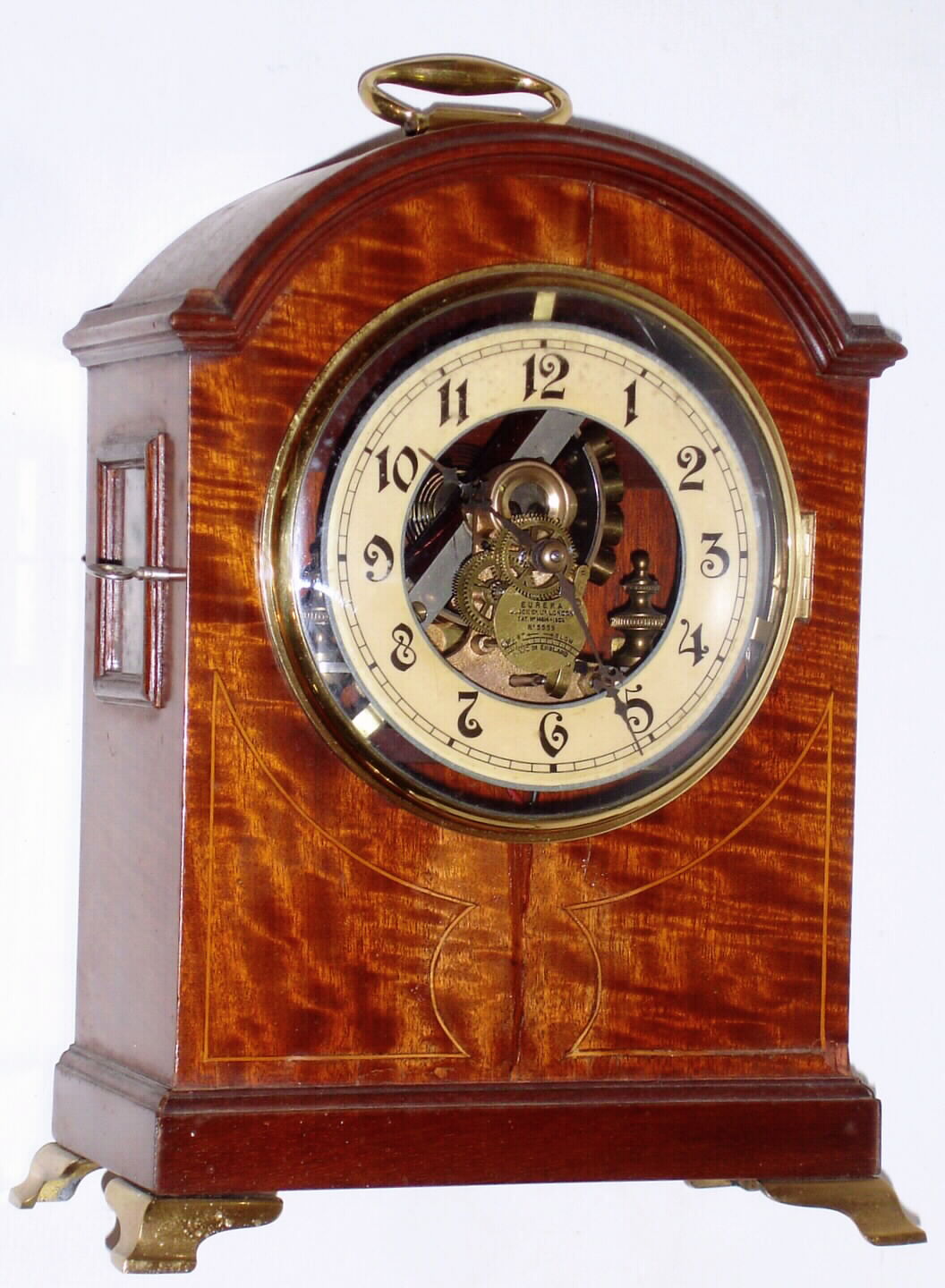 Eureka Clock Co., Ltd., London, No. 5559 early electric tiger striped walnut bracket clock, c1907. — Antique Clocks Price Guide
