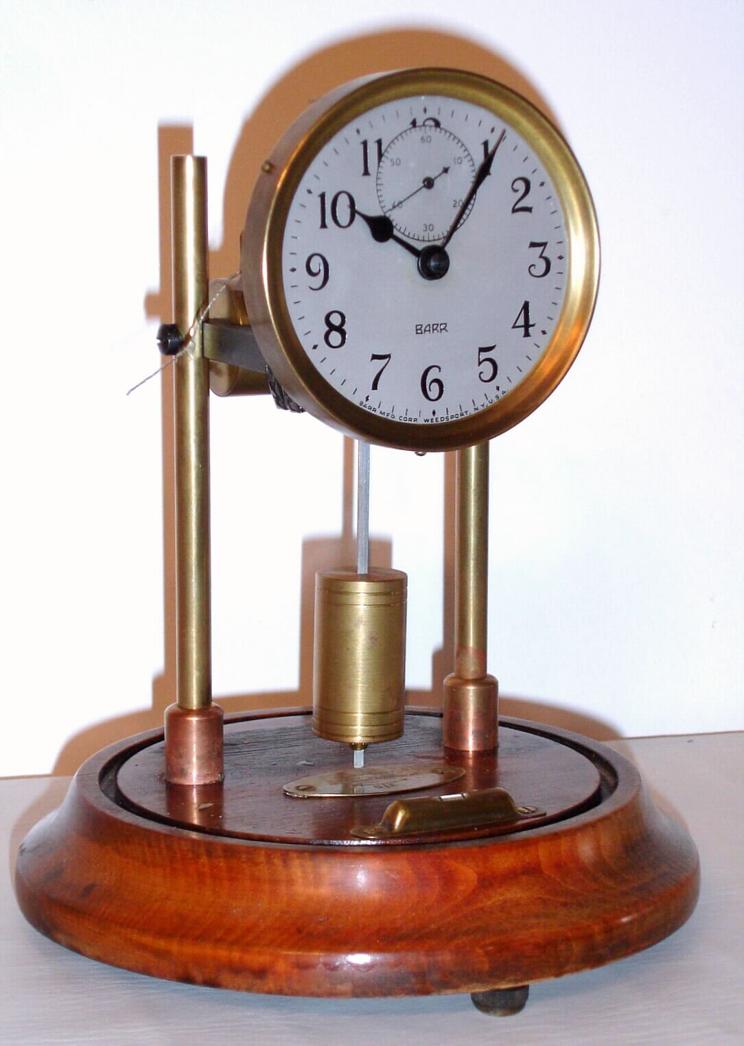 Barr Mfg. Corp., Weedsport, N.Y. electrically impulsed pendulum clock, c1925. — Antique Clocks Price Guide