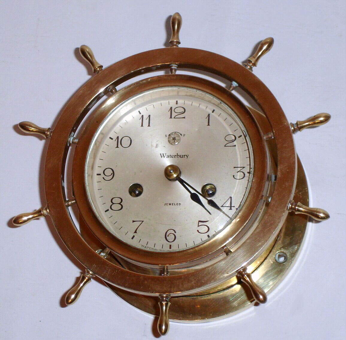 Waterbury Clock Co., Waterbury, Conn., "Ship's Bell No. 10" 8 day time and strike brass marine clock, c1925 — Antique Clocks Price Guide