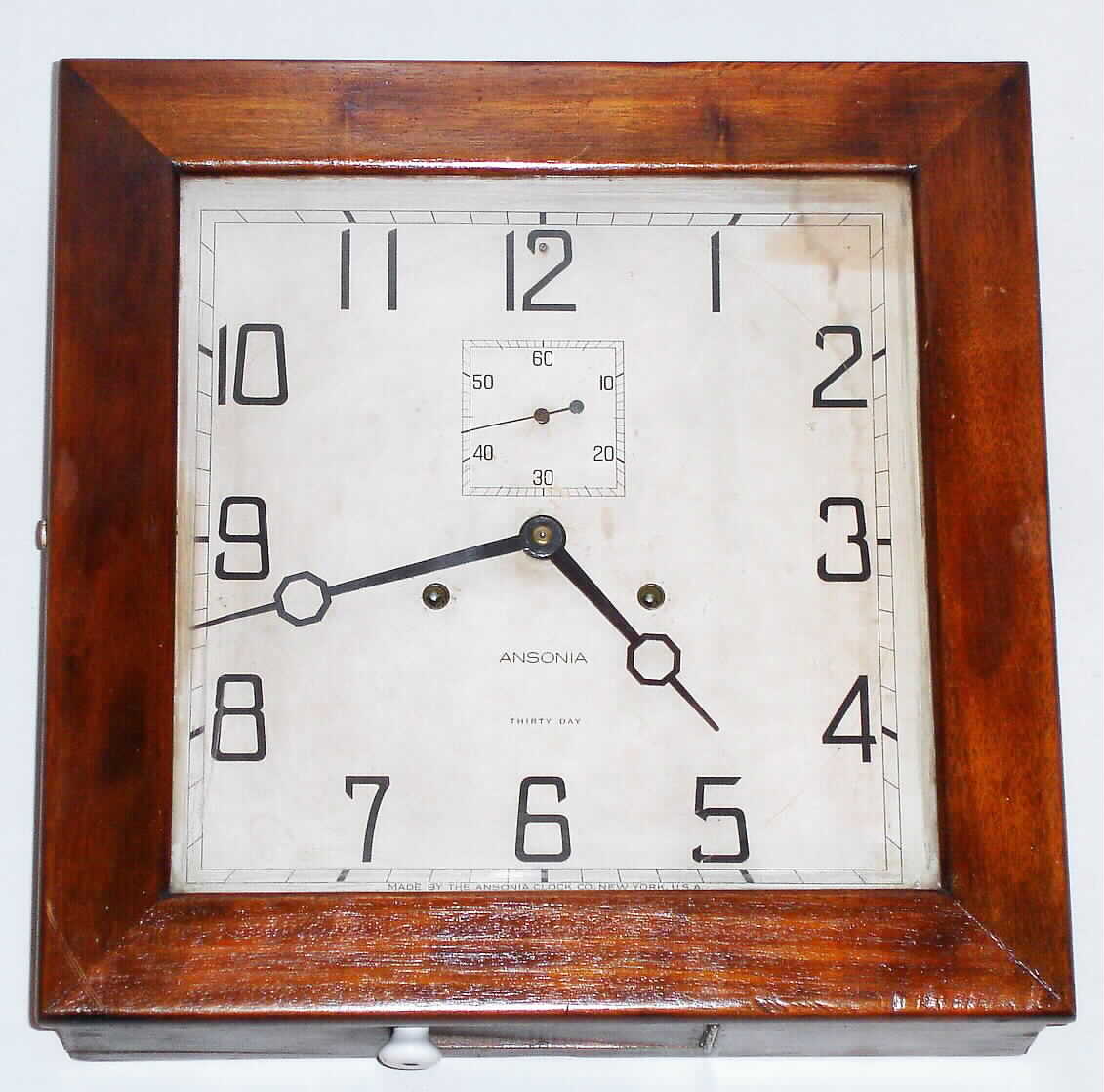 Ansonia Clock Co., "Depot" mahogany gallery clock with 30 day time only spring driven movement, c1926 — Antique Clocks Price Guide