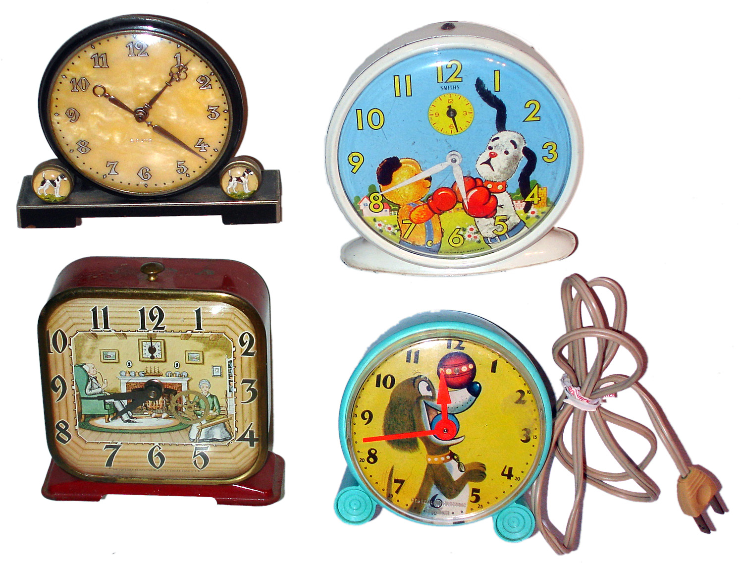 Four dog-related small desk/alarm clocks, 20th century. — Antique Clocks Price Guide