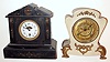 Two American visible escapement mantel clocks. One is Boston Clock Co. tandem wind in black marble case. Second is a Waterbury in white iron French style case. Each is approx. 12" high.
