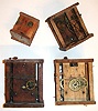 Four Black Forest wooden plate weight driven movements including three of standard size at 8" high and one unusual miniature size.