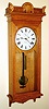 Seth Thomas Clock Co., Thomaston, Conn., "Regulator No. 9" wall clock 8 day time only weight driven movement in oak case with painted metal dial, c1900