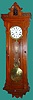 New Haven Clock Co., New Haven, Conn., "Regulator No. 2" wall clock 8 day time only weight driven movement with pinwheel escapement in oak case with porcelain dial and sweep seconds, c1881