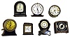 Seven small wind-up clocks and timers. Automatic range timer, Westinghouse automatic electric range, Swiss Thorens with "Auf Wiedersehen" music box, Sessions timer, Phinney Walker lighter, Rexo Interval Timer, and French brass drum clock with cylinder platform.