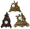 Three French cast-metal figural mantel clocks. All three with elaborate detailed cases, white porcelain dials and round French movements -- two are count wheel striking on bell, other is time only. Shortest shows lad raising his cup, tallest (18") is a standing knight.