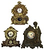 Three metal front Connecticut mantel clocks. Detailed cast fronts, wood boxes behind. Two are 30 hour, 8 day tallest (damaged) of standing sailor is 18" high.