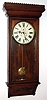 Waterbury Clock Co., Waterbury, Conn., "Regulator No. 67" wall clock 8 day time only 2-weight driven movement in oak case with painted metal dial with Waterbury G-clef hands, c1906