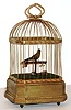 Singing Bird mechanical in cage on a wooden base, c1900