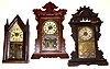 Three wood case shelf clocks. One English 8 day Fattorini and Sons mahogany "Patent Automatic Alarm". One 30 hour Chauncey Jerome early steeple with conical finials. Tallest, Seth Thomas parlor clock with Eclipse pendulum and alarm, is 24" high.