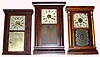 Three Connecticut 30 hour weight driven cornice top shelf clocks. All with inside paper labels. Smallest is Atkins, Porter and Co. cornice top with old mirror tablet. Middle is Seth Thomas, Plymouth Hollow, with lovely gold, blue and floral tablet. Largest, Daniel Pratt, Jr., Reading, Mass., with nearly-flat columns and frosted tablet, is 27" high.