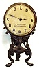 Old Charter advertising 8 day cast metal novelty clock, c1890.