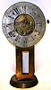 18th Century Continental brass movement and silvered dial on later metal stand.