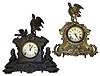 Two Connecticut 8 day bird top cast metal mantel clocks. Detailed heavy fronts and tops with similar bold stance open beak birds. Wooden boxed sides and back. Tallest is 19".