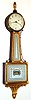 Waltham Clock Co., Waltham, Mass., banjo timepiece 8 day time only weight driven movement in gilded mahogany case with reverse painted tablets, c1930