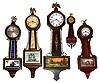 Five small wood case banjo clocks, early 20th century.