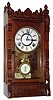 F. Kroeber Clock Co., New York, "Polaris" mantle clock 8 day time and strike spring driven movement in walnut case with paper over metal dial, c1880
