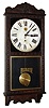 New Haven Clock Co., New Haven, Conn., "Tampa" store regulator wall clock 8 day time only spring driven movement in an embossed oak case with papered metal dial, c1910