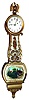 N. H. Brown, Boston, Mass., "Lyre" throat wall clock ,8 day time only weight driven movement in gilt colored case, (now painted) c1915.