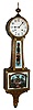 Waterbury Clock Co., Waterbury, Conn., "Willard No. 3" banjo wall clock 8 day time and strike spring driven movement in gold leafed front rope turned mahogany case with reverse painted throat and lower glass tablets and white enamel dial, c1910