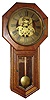 Seth Thomas, Thomaston, Conn., "World" wall clock 15 day time only spring driven movement stamped "40" in oak case with brass dial, c1915