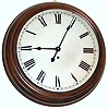 Gallery clock 8 day time only spring driven movement in a mahogany case with painted metal dial, c1910