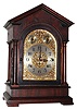Seth Thomas Clock Co., Thomaston, Conn., "Chime Clock No. 2001" mantle clock 8 day time, strike and chime spring driven movement with separate chiming movement on 8 large deep toned Sonora patented resonated bells in mahogany case with beveled glass door and silvered brass dial with brass appliquEs, c1915
