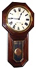 Seth Thomas Clock Co., Thomaston, Conn., "Globe" wall clock 8 day time and strike spring driven movement in mahogany case with painted metal dial, c1920
