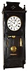 Seth Thomas Clock Co., Thomaston, Conn., "Flora" ebonized 8 day time and strike weight driven wall clock, dated 1885