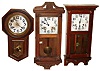 Three oak 8 day time and strike wall clocks, early 20th century.